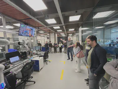 BhamXR members watching a robotics demonstration in the Extreme Robotics Lab